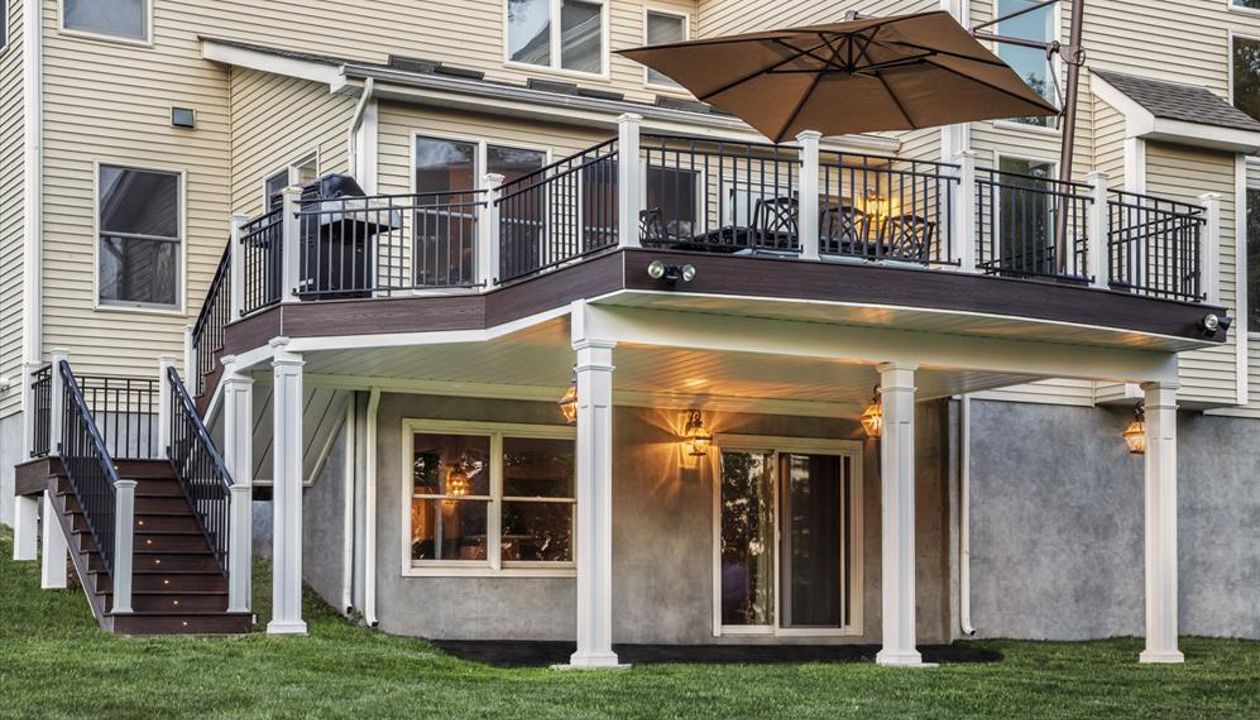 In Bridgewater, N.J., Lava Rock Trex Transcend fascia takes its proper place — front and center — in the design of this expansive, second-story, radius-front deck.