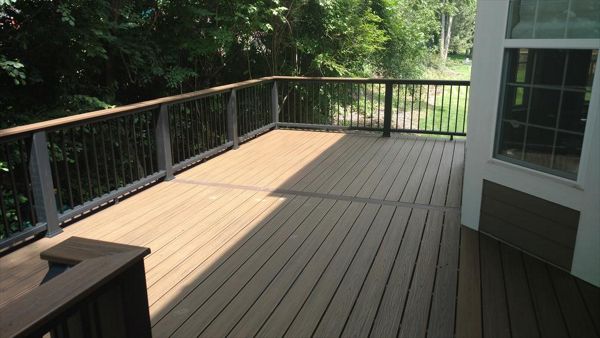 Cocktail rail, Spiced rum, black post and rails, square aluminum balusters, Vintage lantern accent