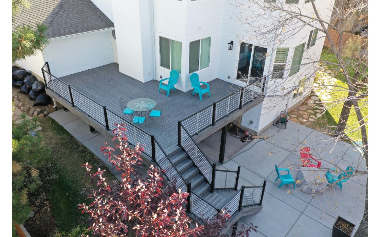 Transcend Island Mist Decking with Black / Platinum Signature Rod Rail