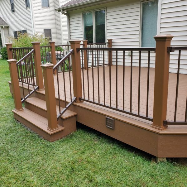 Transcend decking with Signature Aluminum railing complete this great rear deck in Woodstock, IL