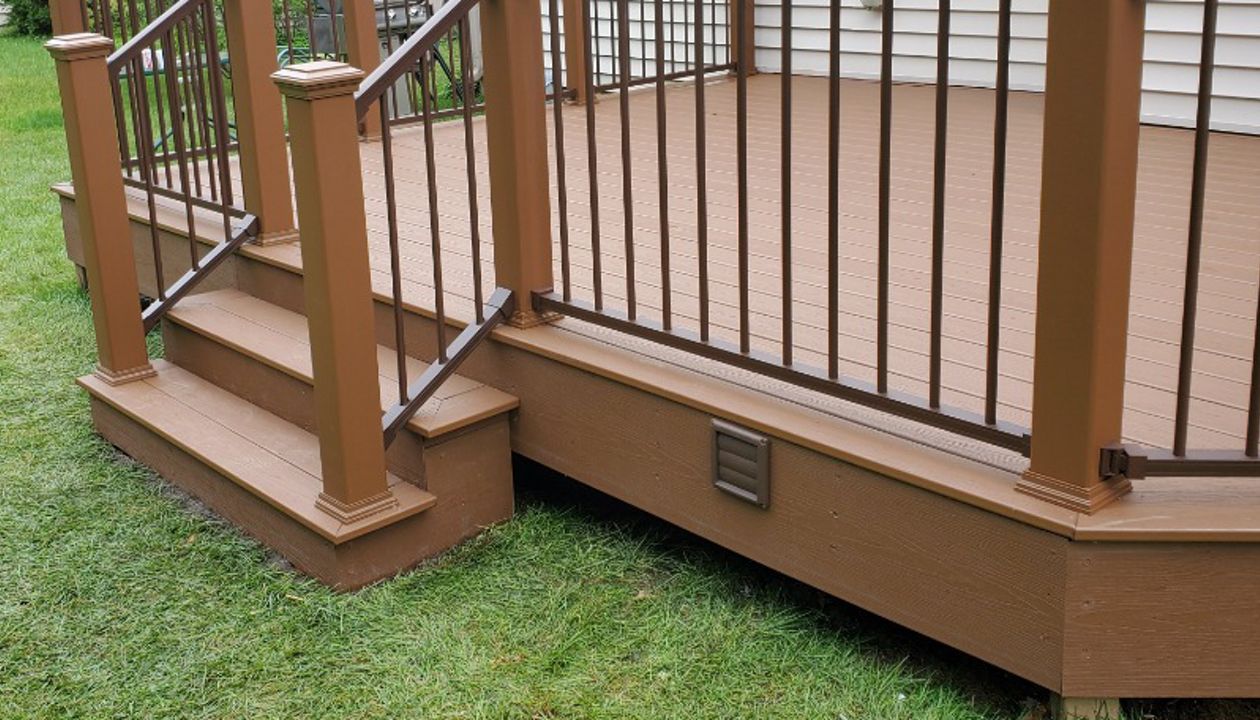 Transcend decking with Signature Aluminum railing complete this great rear deck in Woodstock, IL