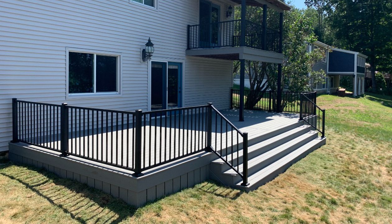 Pebble Grey decking, Pebble Grey fascia, Signature Charcoal Black railing