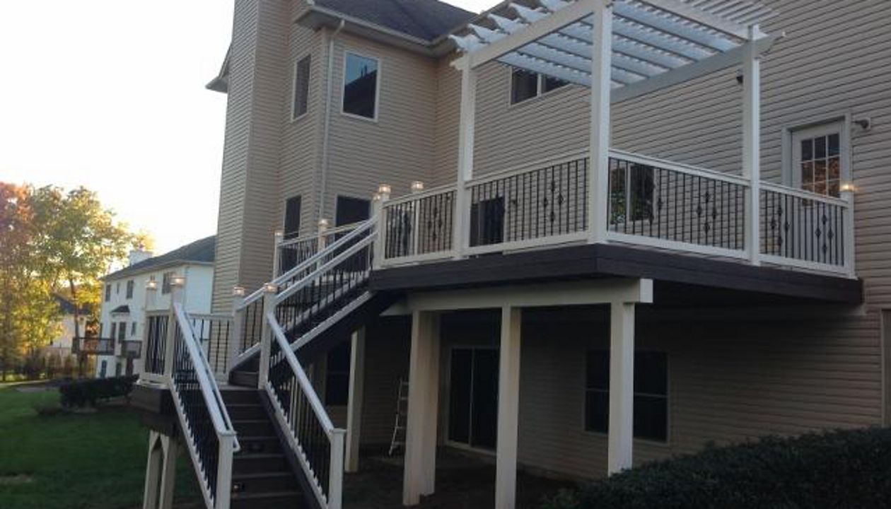 trex decking with pvc railing and pergola