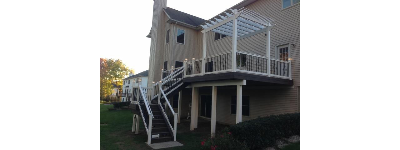 trex decking with pvc railing and pergola