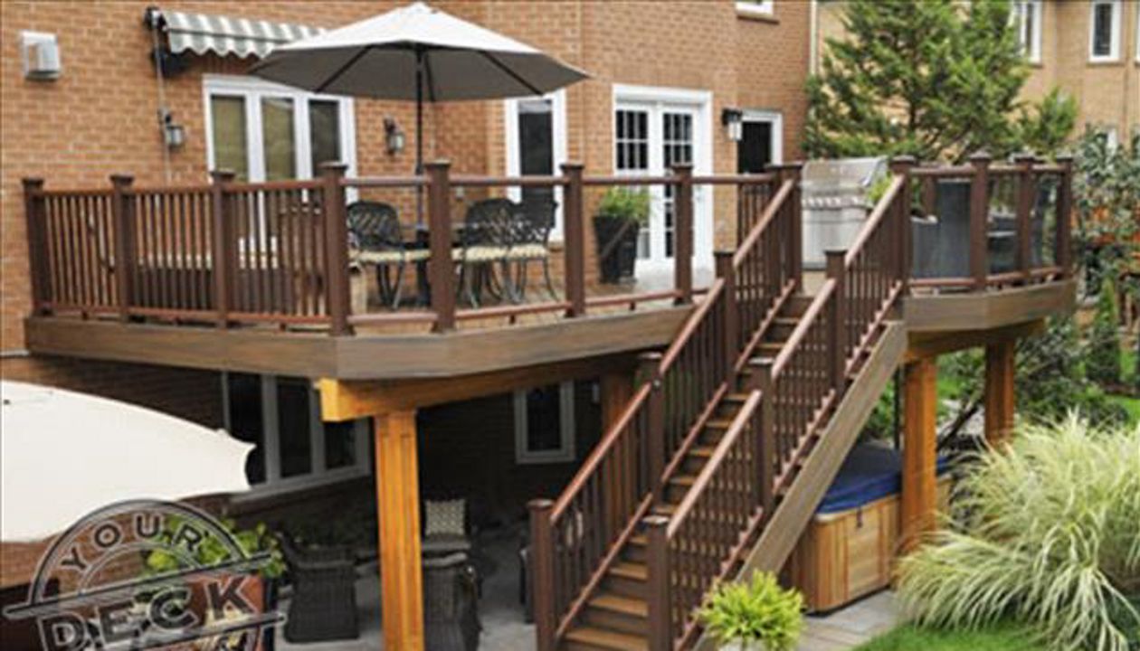 High deck with dry area below by Your Deck Co. in Aurora