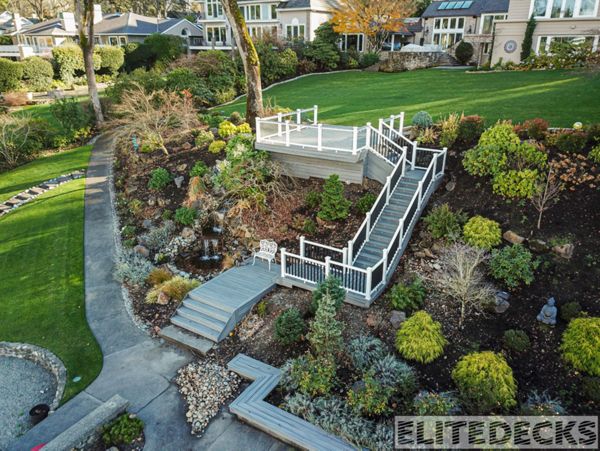 rex Island Mist Transcend with White Glass railing Deck