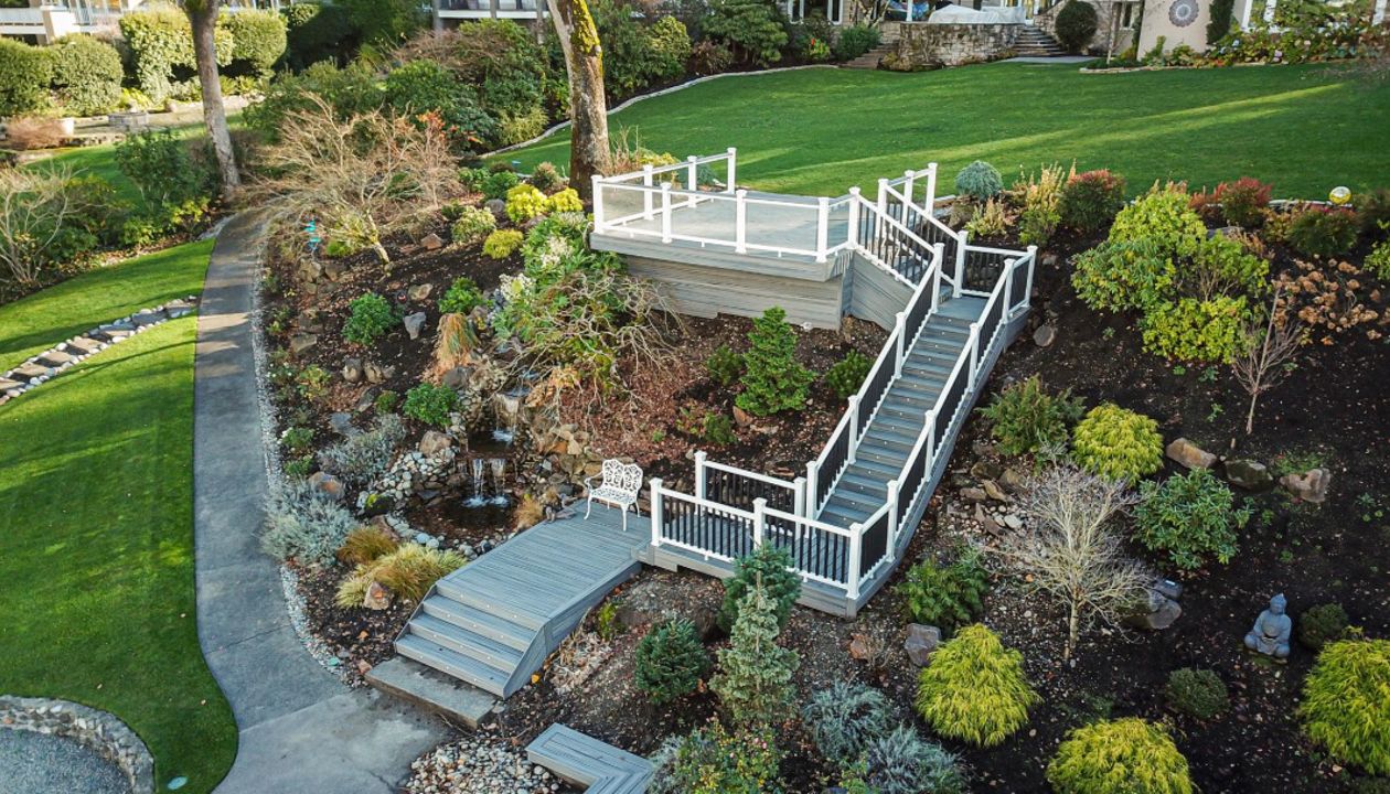 rex Island Mist Transcend with White Glass railing Deck