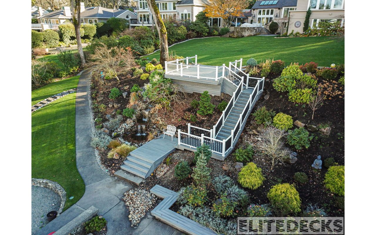 rex Island Mist Transcend with White Glass railing Deck