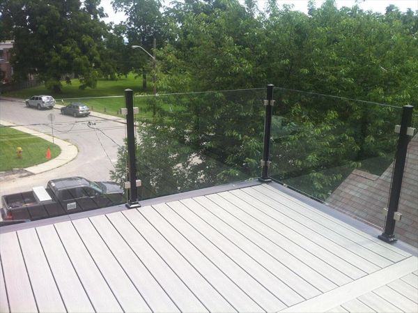 Trex Tropical Spiced Rum custom made COMPOSITE deck with glass and aluminum railing. The deck built in Toronto, Mississauga, Scarborough, Etobicoke, North York, Markham, Richmond Hill, Thornhill, Vaughan