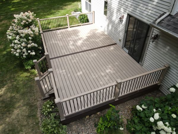 Lifetime of memories to be had on this Trex Transcend Rope Swing and Vintage Lantern deck!