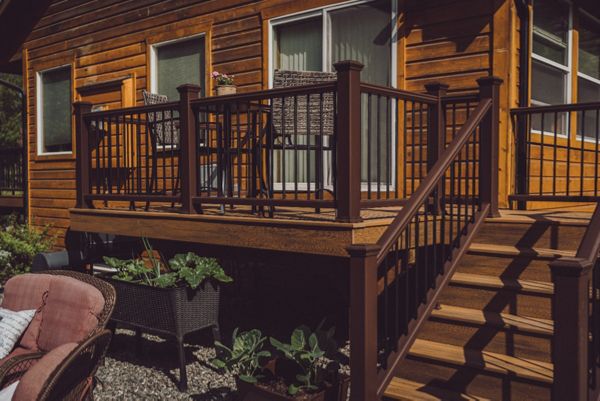 Craving the sun? Trex Transcend Havana Gold with Vintage Lantern rail system shown.