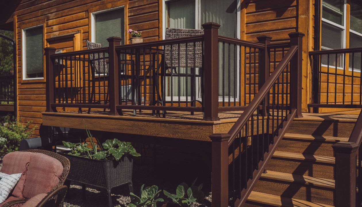 Craving the sun? Trex Transcend Havana Gold with Vintage Lantern rail system shown.