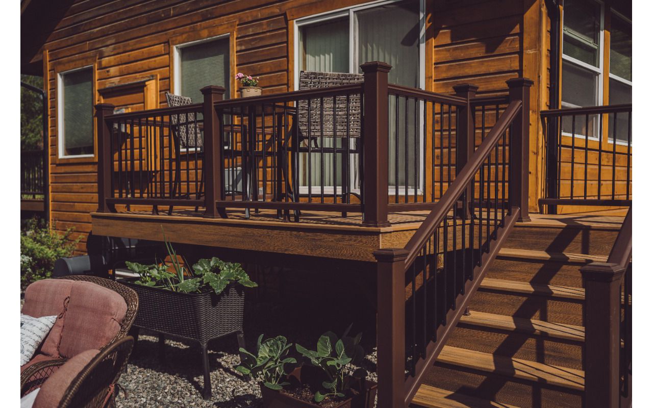 Craving the sun? Trex Transcend Havana Gold with Vintage Lantern rail system shown.