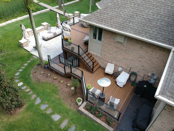 Trex Havana Gold decking with a double Spiced Rum border. Also including a Trex Signature Platinum Rod Railing.