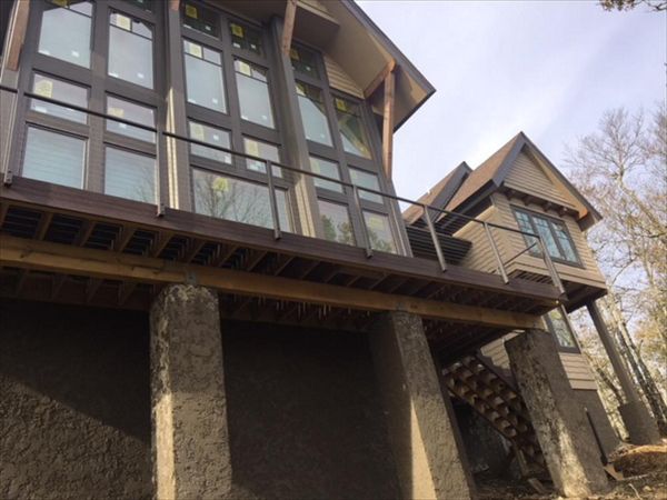 Trex Transcend deck fits great with this rustic custom home.