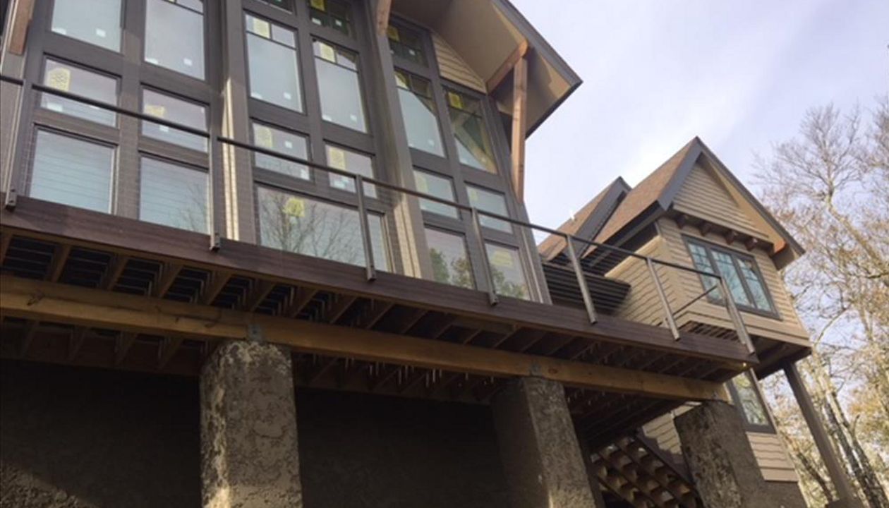 Trex Transcend deck fits great with this rustic custom home.