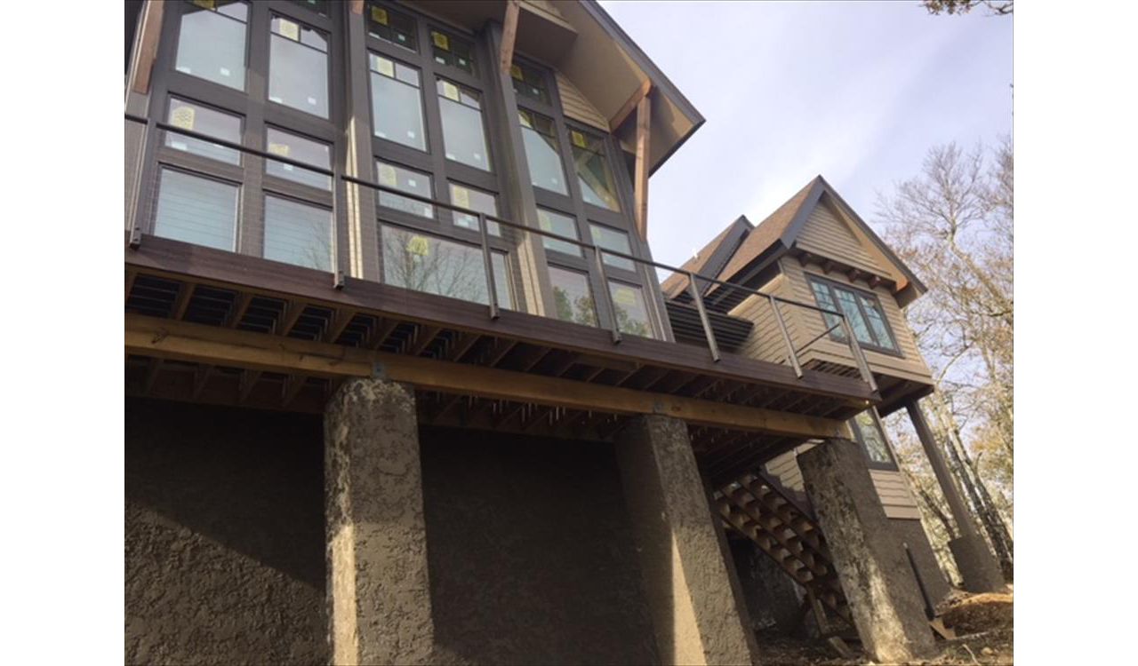 Trex Transcend deck fits great with this rustic custom home.