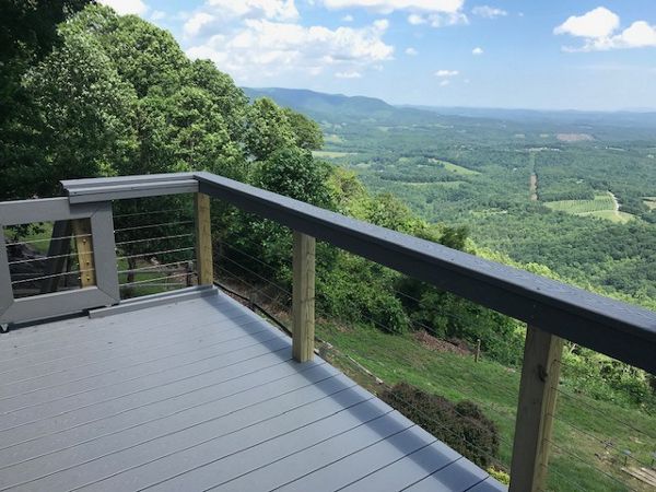 What an amazing view of the valley from this Trex Select Pebble Grey deck!