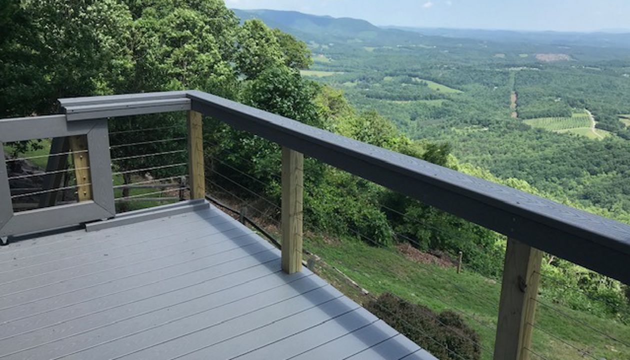 What an amazing view of the valley from this Trex Select Pebble Grey deck!