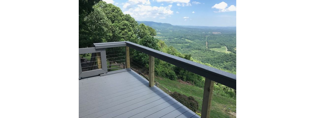 What an amazing view of the valley from this Trex Select Pebble Grey deck!