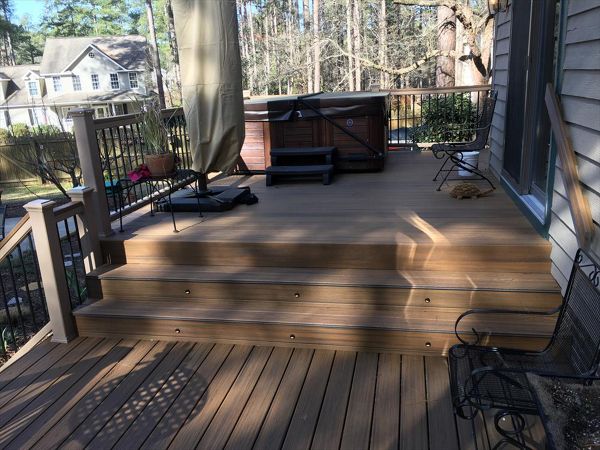 Trex Havana Gold fascia boards with riser lights are essential for great backyard parties