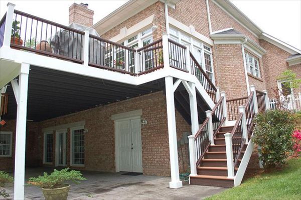Trex Transcend Tiki Torch deck with Transcend Vintage Lantern handrails & Trex Elevations framing Bermuda Run, NC.