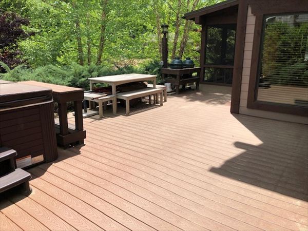 Trex Select Saddle grilling porch with a great view of the stream