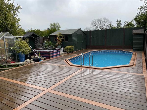 Trex Transcend Tropicals Spiced Rum with Trex Transcend Tiki Torch accents for thgis pool deck in Sidcup Kent.