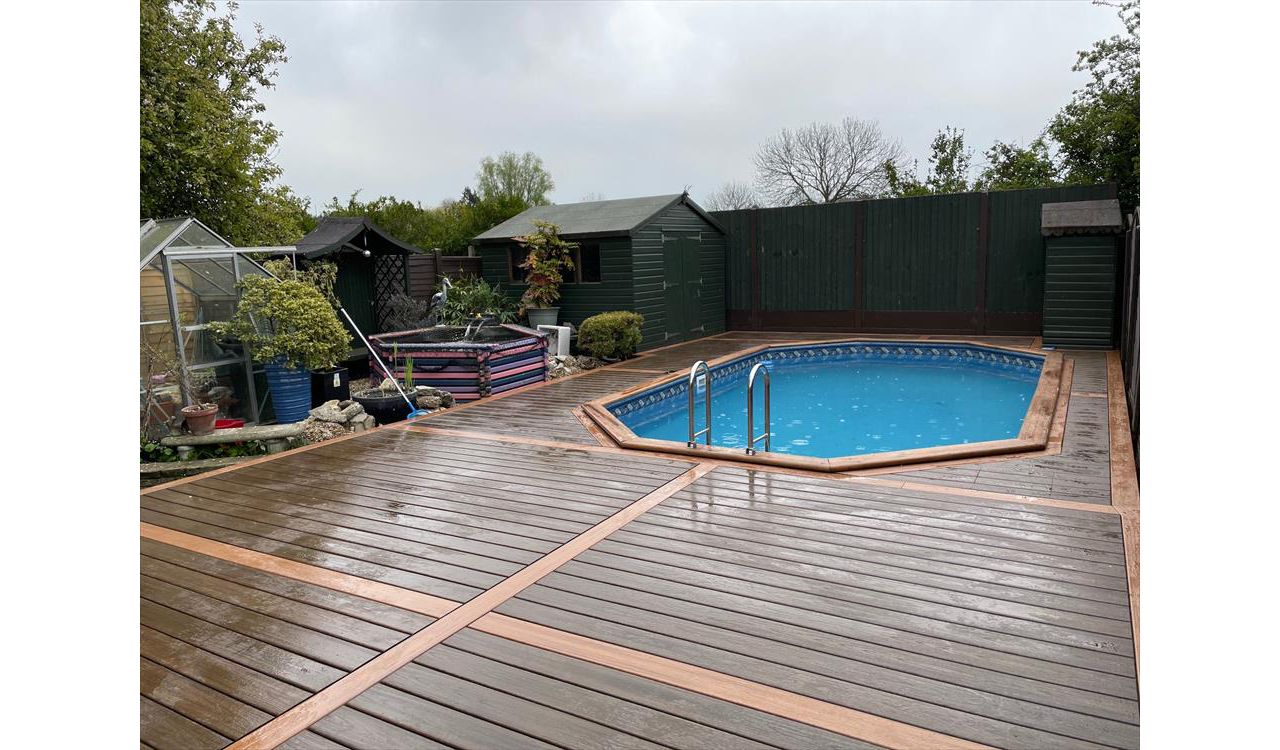 Trex Transcend Tropicals Spiced Rum with Trex Transcend Tiki Torch accents for thgis pool deck in Sidcup Kent.