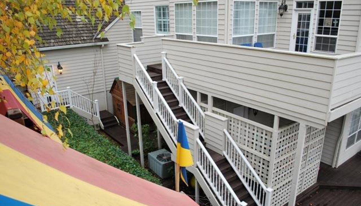 White Transcend Rail with Woodland Brown decking