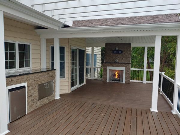 Gas fireplace, pass through bar top over Trex decking