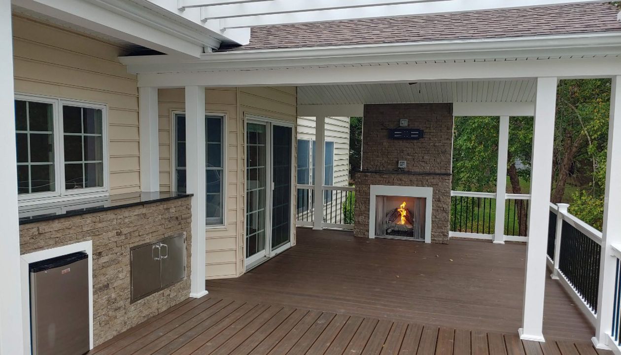 Gas fireplace, pass through bar top over Trex decking