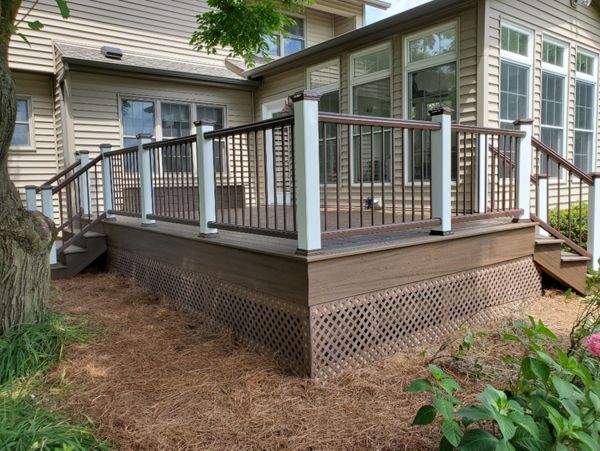 Trex Transcend decking and railing complete this beautiful side deck in Spring Grove, IL