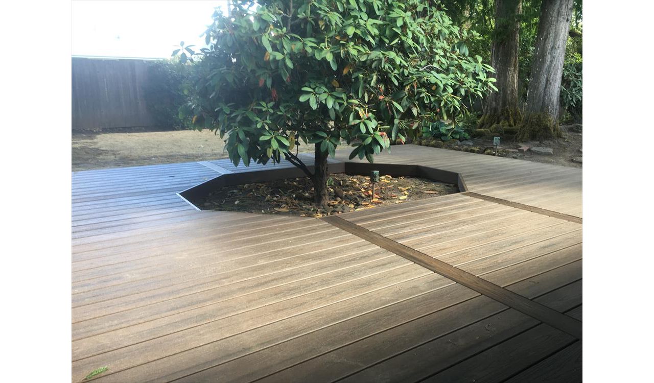 Spiced Rum decking with the expansion dividers centered on the tree cut out