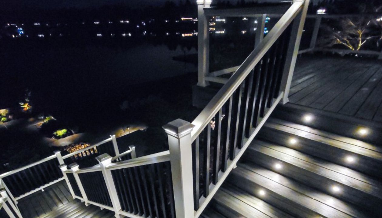 rex Island Mist Transcend with White Glass railing Deck