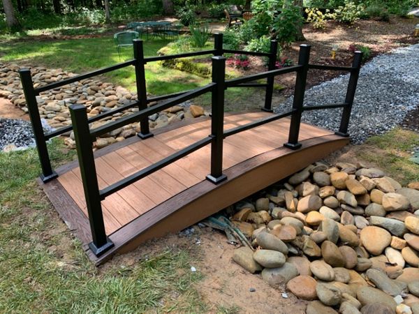 Dry bed bridge made of Tiki Torch trimmed in Spiced Rum with Signature Railing.