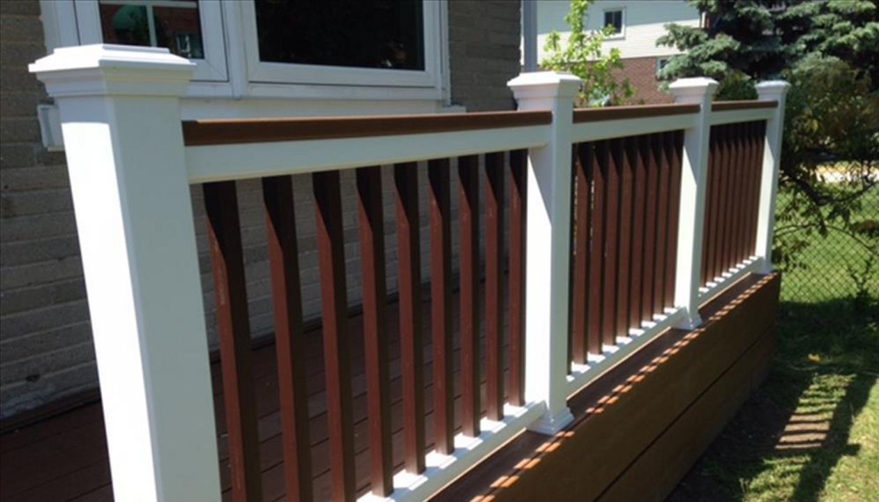 Trex Select Saddle custom made COMPOSITE porch with Trex Select Madeira railing and classic white posts. The Porch built in Toronto, Mississauga, Scarborough, Etobicoke, North York, Markham, Trex