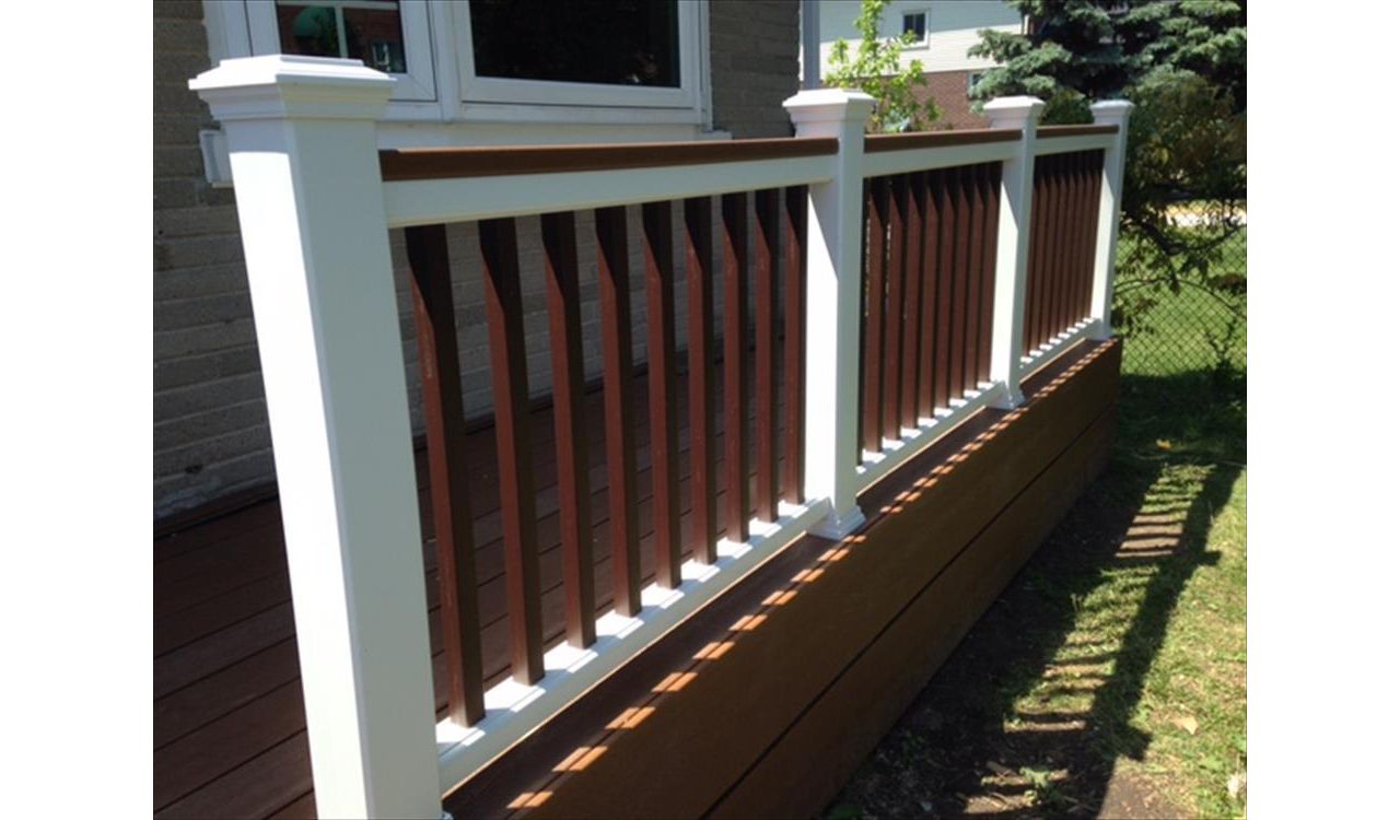 Trex Select Saddle custom made COMPOSITE porch with Trex Select Madeira railing and classic white posts. The Porch built in Toronto, Mississauga, Scarborough, Etobicoke, North York, Markham, Trex