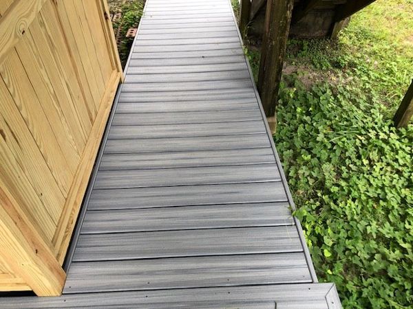 This Trex Enhance Naturals Foggy Wharf ramp & shower area are welcoming to any beach guest