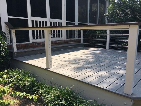 Low Trex deck with stainless cable railing and Trex top rail