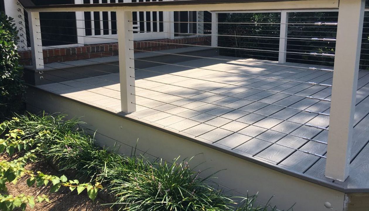 Low Trex deck with stainless cable railing and Trex top rail