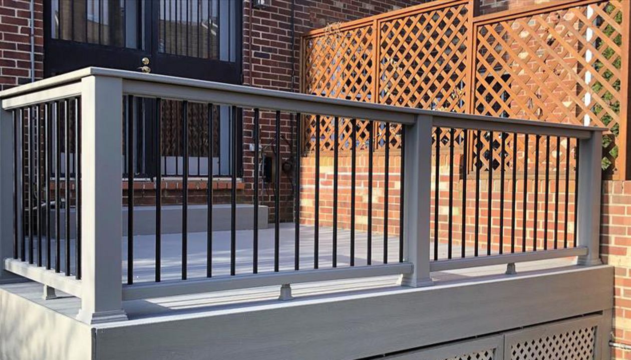 McLean, VA deck with Trex Select Pebble Gary and Gravel Path Trex Transcends railing