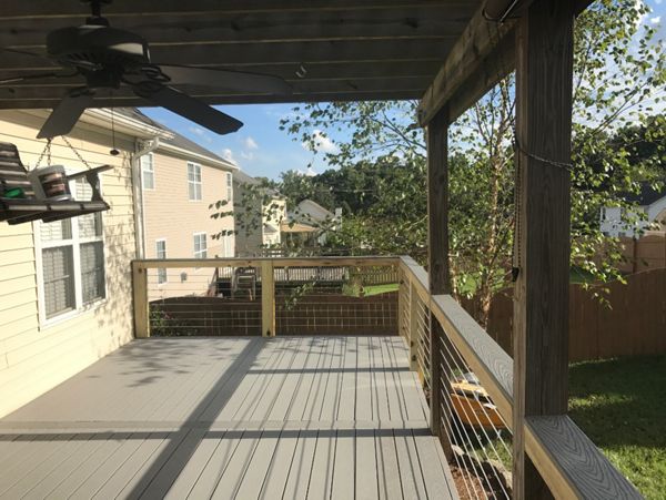 The feature board on this Trex Select Pebble Grey deck provides a wonderful visual design break