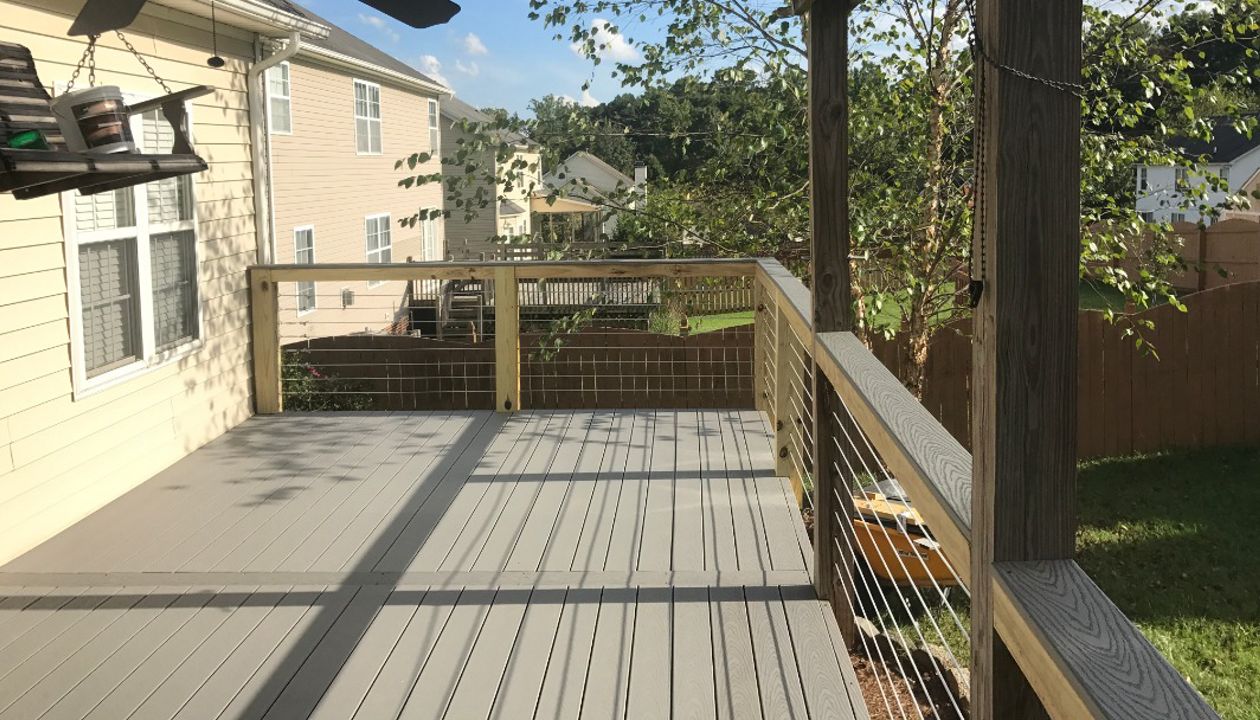 The feature board on this Trex Select Pebble Grey deck provides a wonderful visual design break