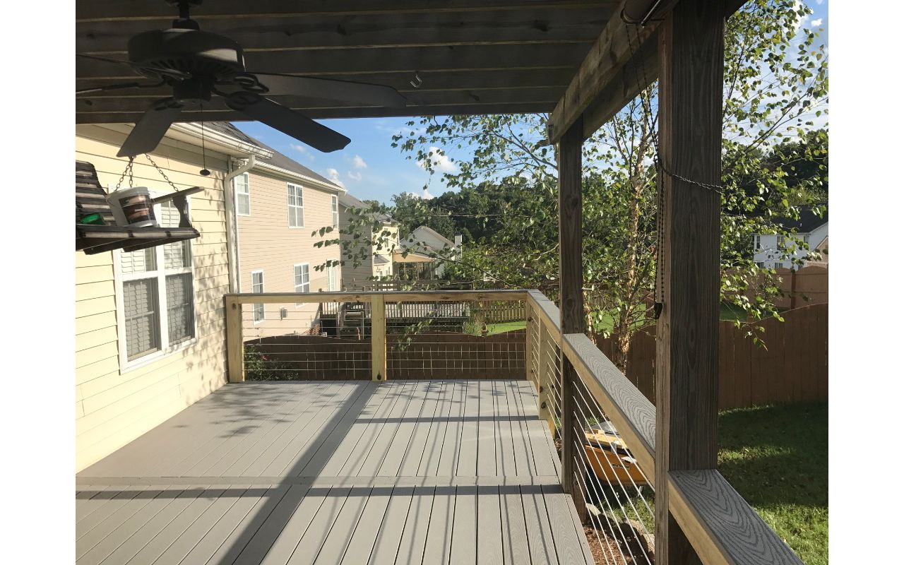 The feature board on this Trex Select Pebble Grey deck provides a wonderful visual design break