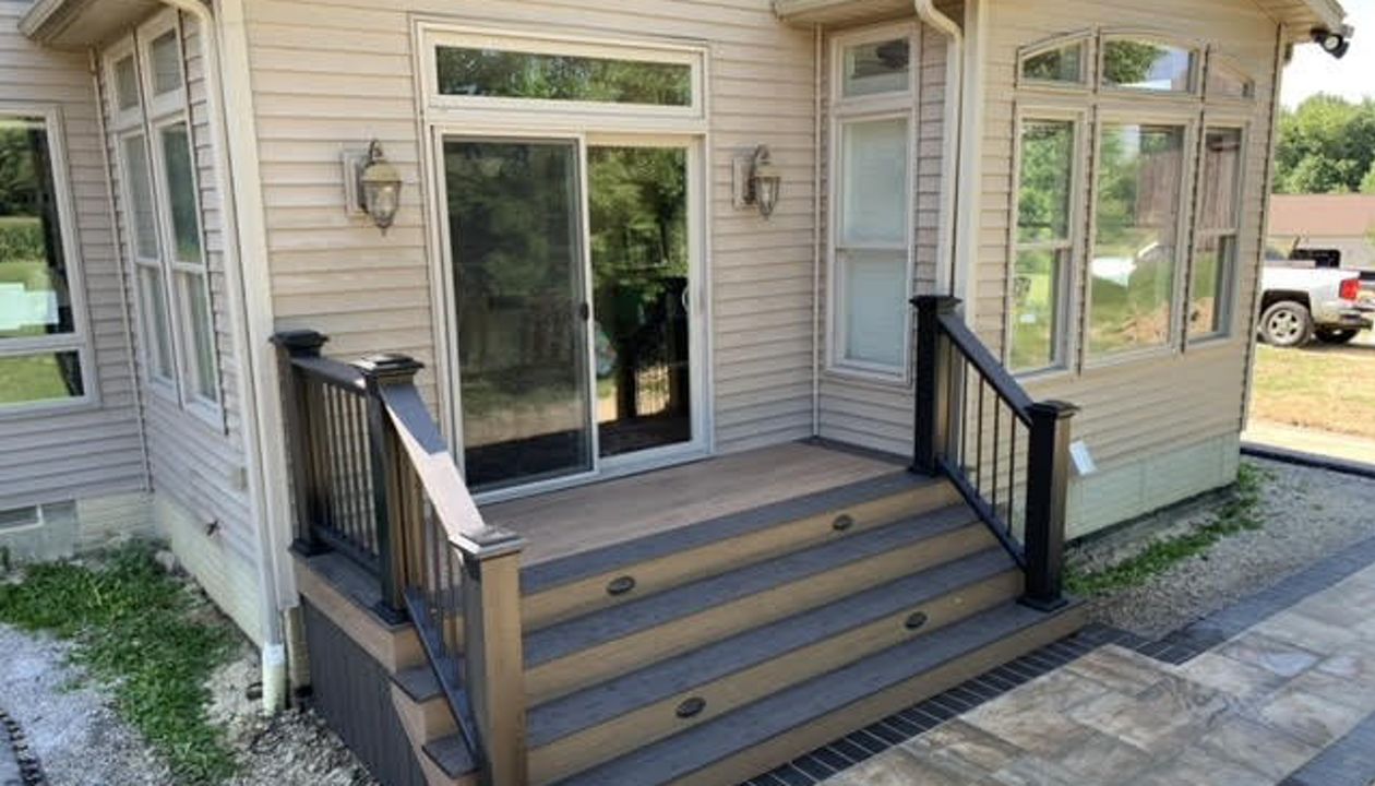 Back door steps with Black Trex rail