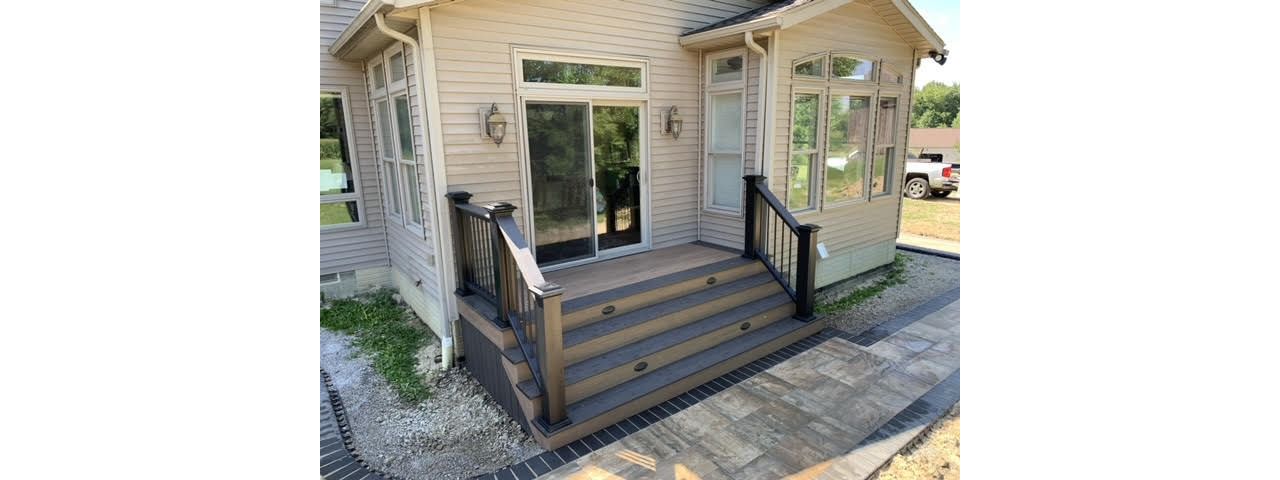 Back door steps with Black Trex rail