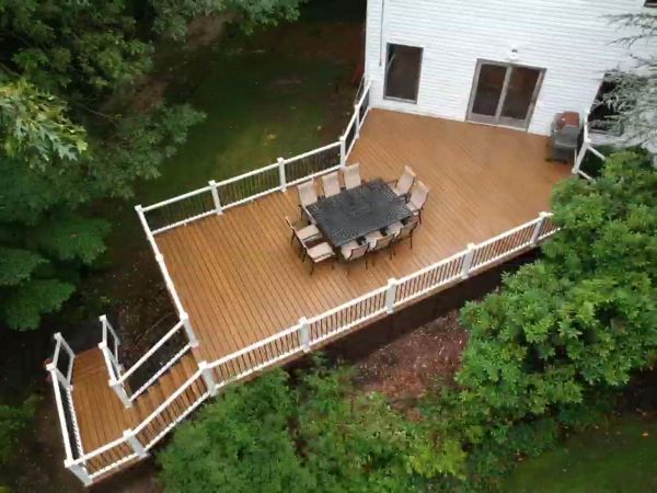 Havana Gold deck with steps leading down to pool
