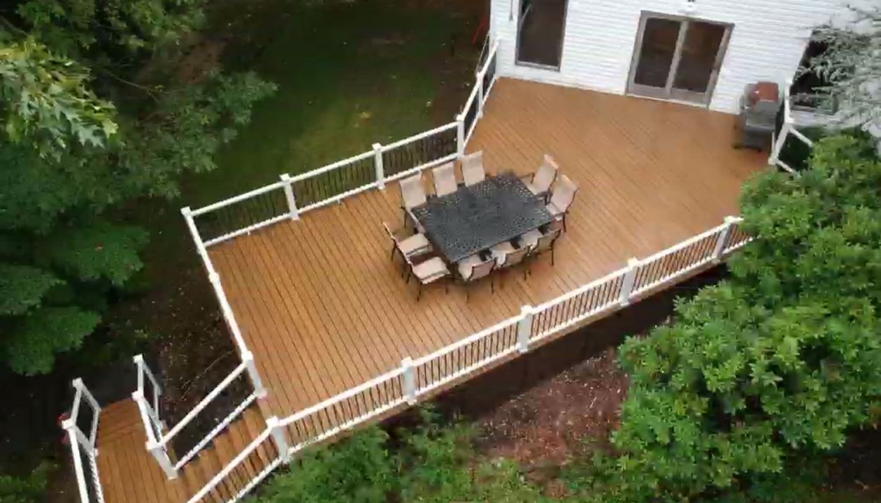 Havana Gold deck with steps leading down to pool
