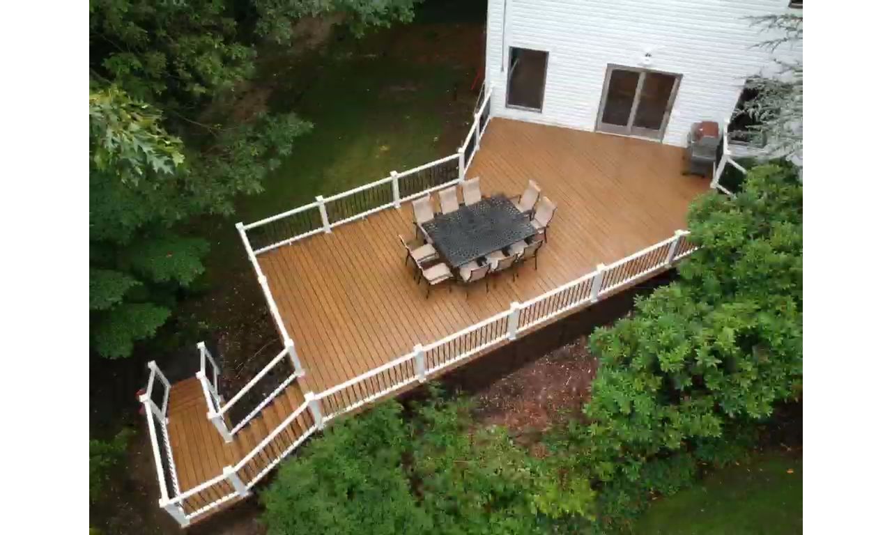 Havana Gold deck with steps leading down to pool